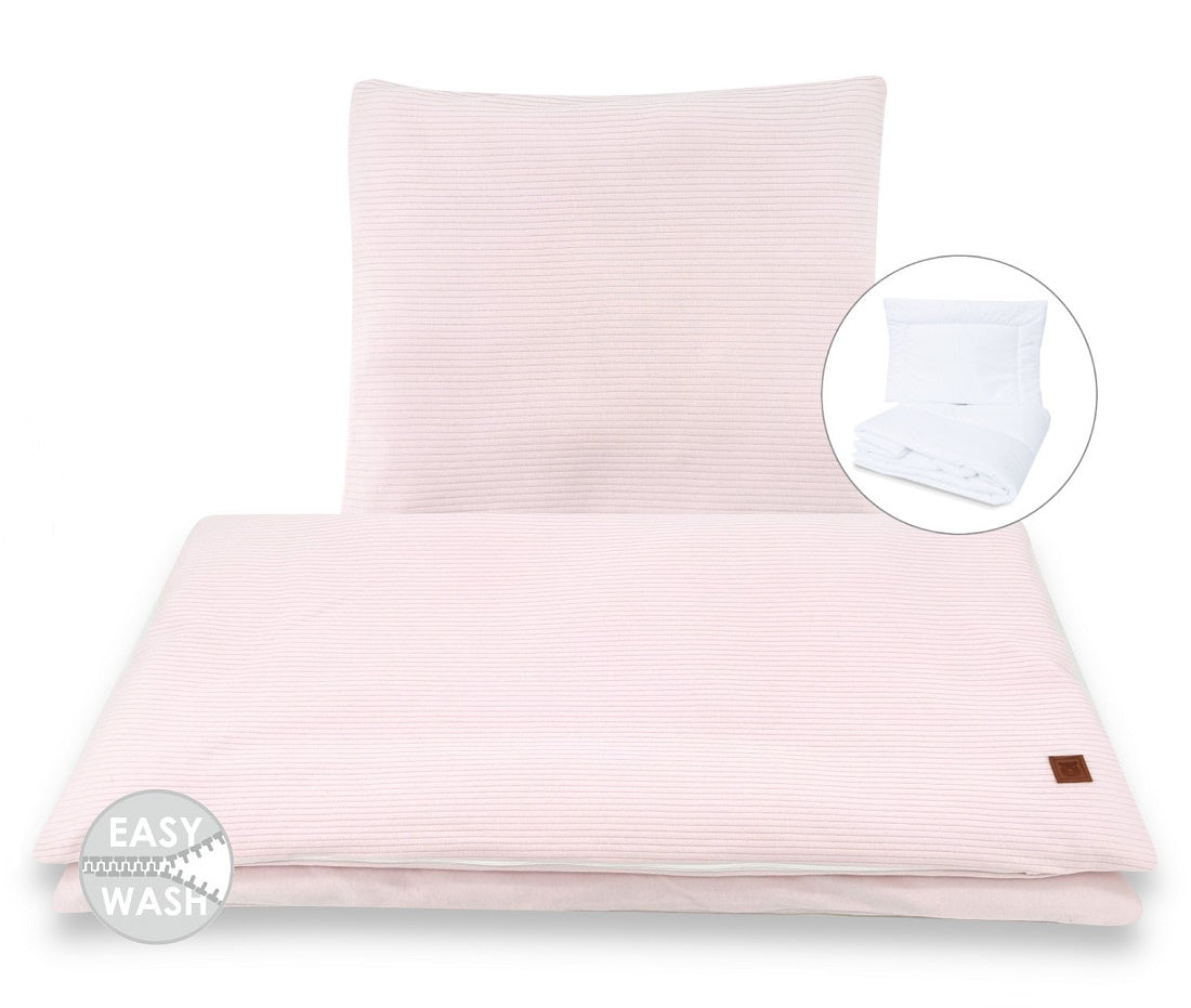 Weiches rosa Nestchen als Randschutz im Babybett